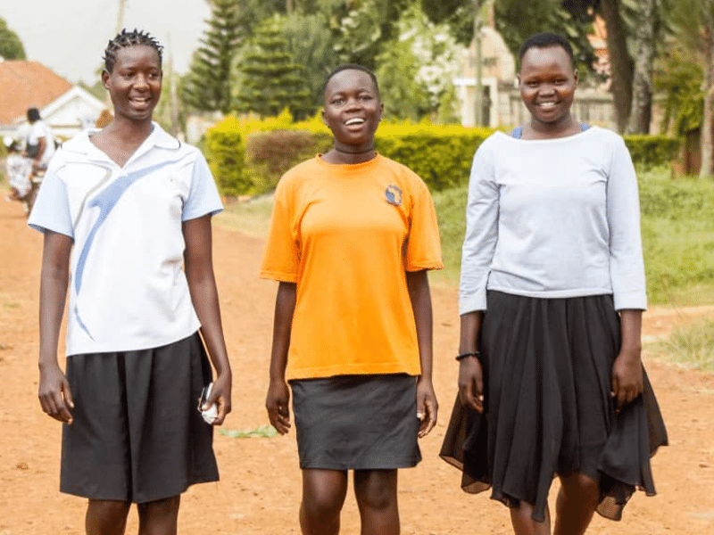 3 older girls walking